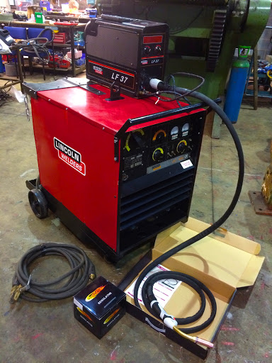 A welding transformer is used to convert the